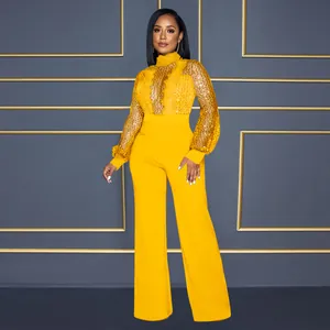 Combinaison jaune à manches longues avec corsage en mesh à paillettes