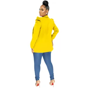 Back view of a vibrant yellow long-sleeved blazer with elegant pleated shoulder details
