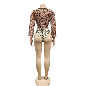 Back view detail of sexy leopard print mesh three-piece bikini set on female mannequin