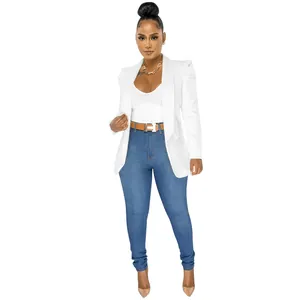 Stylish white long-sleeved blazer with ruffled shoulders for a modern professional look.