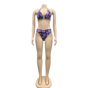 Detailed front view of purple peacock feather print bikini set on mannequin