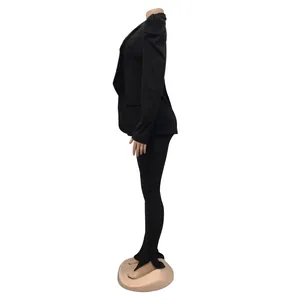 Side view of a sophisticated black long-sleeved pleated blazer displayed on a mannequin.