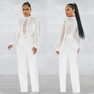 Elegant white long sleeve jumpsuit with lace hollow-out details and belt in two views
