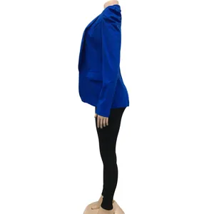 Side view of women's royal blue blazer with pleated long sleeves on mannequin
