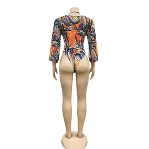 Back view of a sexy long-sleeved mesh bodysuit with abstract colorful graffiti print