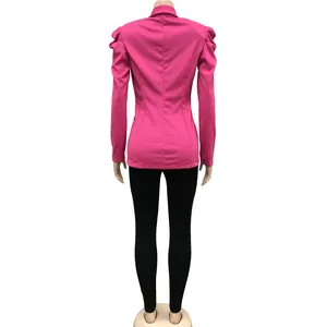 Back view of a stylish hot pink pleated long sleeve blazer jacket for women on mannequin
