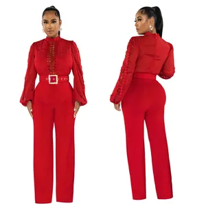 Front and back detailed views of a red hollow-out lace jumpsuit with matching belt