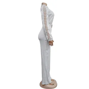 Side view of elegant white long sleeve jumpsuit featuring lace hollow-out sleeve details