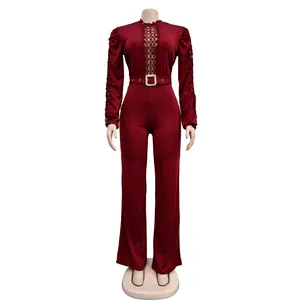Elegant wine red long sleeve jumpsuit with lace hollow-out detail and waist belt