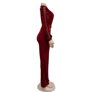 Side view of a maroon long-sleeve jumpsuit featuring elegant lace hollow-out sleeves.