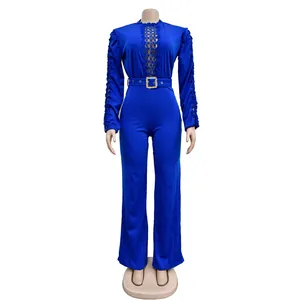 Elegant royal blue long sleeve jumpsuit featuring hollow lace detail and matching belt