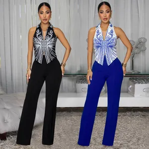 Chic halter neck printed top paired with high waist wide leg pants in black and blue