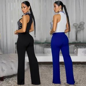 Elegant two-piece set with printed sleeveless top and high-waist wide-leg pants back view.