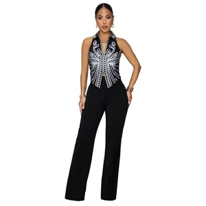 Full-body view of fashion two-piece set with printed top and black flared trousers.