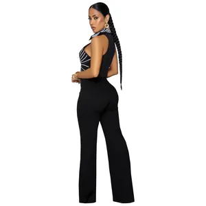 Rear view of elegant black two-piece set with sleeveless printed top and wide-leg pants