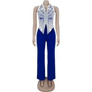 Two-piece elegant outfit featuring a blue print sleeveless top and high-waisted trousers