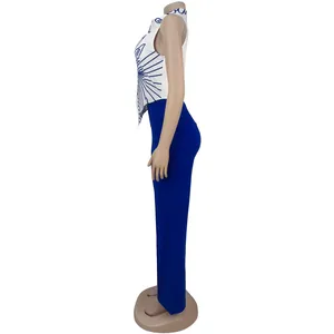 Side view of women's two-piece set featuring printed sleeveless top and blue trousers