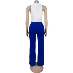 Back view of elegant women's two-piece set with white sleeveless top and blue pants