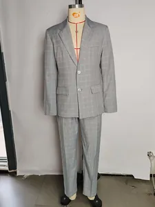 Professional full-length front view of a grey plaid formal business suit set for men
