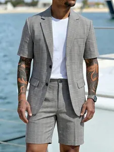 Detailed view of grey plaid short sleeve men's casual business suit set for summer