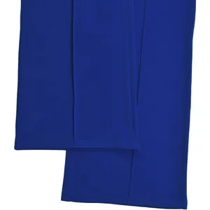 Detailed macro view of the royal blue trouser hem featuring precision double-row stitching