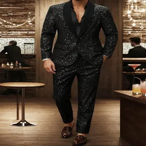 Detailed view of a black sparkly men's banquet suit set in a bar setting