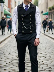 Detail view of a men's double-breasted business vest with decorative metal chain