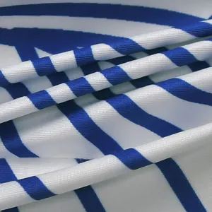 Macro view showing the soft texture and blue white striped print of the elegant outfit