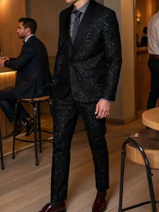 Detail of black men's suit with sparkling star-like patterns for formal evening events.