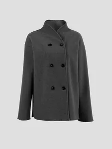 Detailed view of a stylish dark grey double-breasted woolen coat with stand-up collar