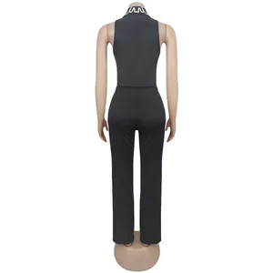 Back view of an elegant black sleeveless top and pants set with a printed collar.