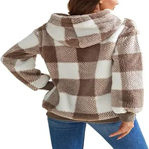 Detailed back view of a cozy brown and white checkered fuzzy hooded fleece jacket for winter