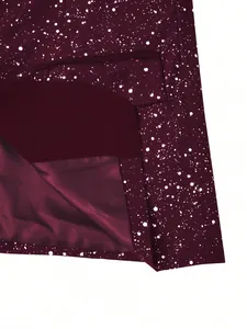 Close-up detail of burgundy men's banquet suit jacket with white metallic sparkle splatter print