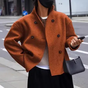 Stylish burnt orange double-breasted wool coat for women featuring a casual British style
