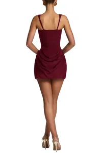 Back view of a burgundy sleeveless bodycon mini dress with draped ruched detailing.