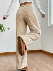 Soft cream fuzzy plush wide-leg pants for women featuring a cozy high-waisted fit