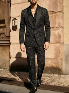 Stylish men's black suit set with white sparkle patterns for wedding and party wear
