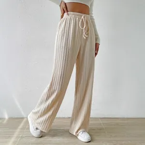 Elegant high-waisted beige textured wide-leg knit trousers for women with elastic waist