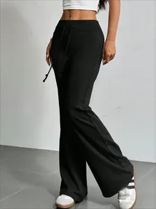 Pantalón de campana negro de cintura alta para mujer con cordón ajustable y corte entallado