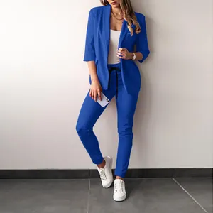 Professional royal blue women's two-piece casual blazer and matching trousers suit set
