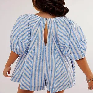 Detail of the back on a striped blue and white summer romper with a keyhole opening