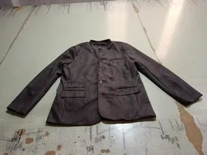 Vintage men's suede work jacket featuring a stand collar and multi-pocket utility design.