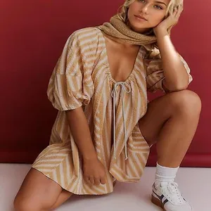 Casual striped short jumpsuit with deep V-neck and puff sleeves on a female model