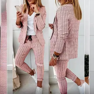 Women's chic pink plaid blazer and matching trouser suit for casual business style
