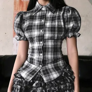 Detailed view of a retro plaid short sleeve shirt with puff sleeves and slim fit design