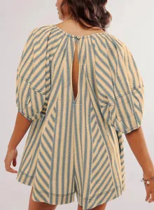 Detailed back view showing the stylish deep V opening of this striped summer romper.