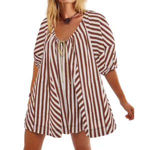Detailed view of striped short-sleeve romper with deep V-neck and decorative tie