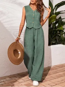 Elegant green linen sleeveless vest and wide-leg trousers summer set for women