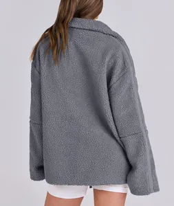 Back view of a warm grey oversized teddy fleece jacket for women.