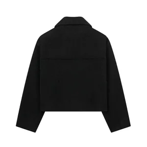 Hochwertige Rückansicht einer minimalistischen schwarzen strukturierten Tweed-Kurzjacke
